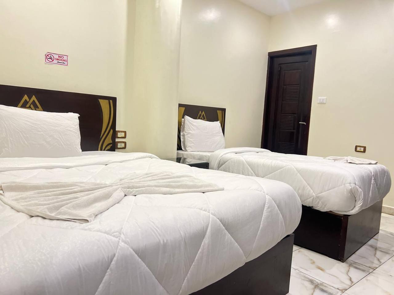 City Pyramids Inn Kafret el-Gabal Esterno foto